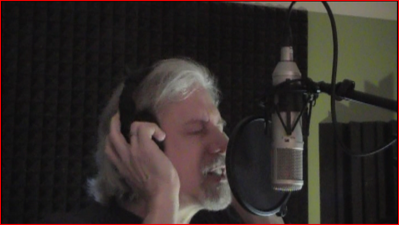 Rahj singing in the studio